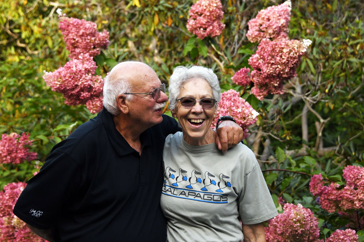 069 Adam and Monika Broughton celebrate a lighter moment after stealing kisses among the flowers..jpg